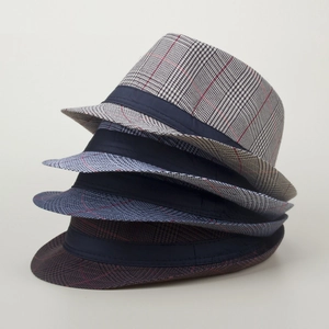Vertical stack of men's striped trilby hats featuring retro plaid patterns and ribbon bands