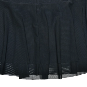 Detailed view of black mesh fabric with layered texture and soft draped hemline