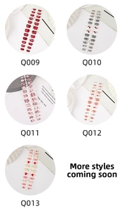 Selection of press-on nails with floral and heart patterns in various stylish designs