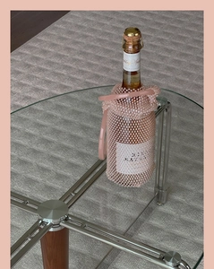 Handmade pink beaded wine carrier bag with crystal details and sturdy carrying handle