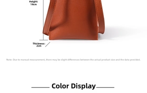 Detail view of mini leather phone bag showing 19cm height and 2cm thickness dimensions