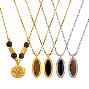 Vintage French shell pendant necklaces with tiger eye stones in gold and silver finish