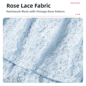 Macro shot of breathable light blue lace fabric with vintage rose mesh patterns