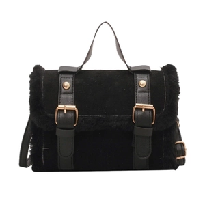 Retro black plush cylindrical handbag with gold metal hardware and faux leather handles