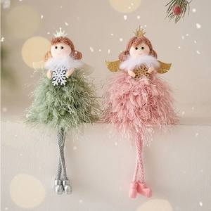Christmas angel ornaments in green and pink with snowflake wings and crown decorations