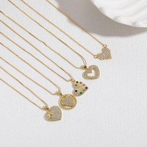 Set of five elegant heart-shaped zircon pendant necklaces in polished gold finish