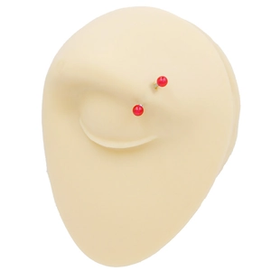 Silicone eyebrow piercing training model with red spherical jewelry on white background