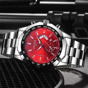 Detailed macro view of the bold red chronograph dial and steel tachymeter bezel