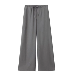 Detail view of dark grey wide-leg lounge pants with drawstring waist and linen texture