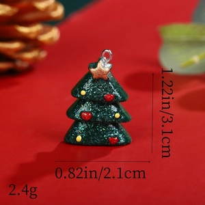 Macro view of green glitter resin Christmas tree pendant with size and weight parameters