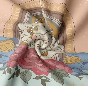 Detailed macro of tarot tapestry fabric showing fine weaving and bohemian floral prints