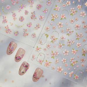 Pink cherry blossom nail stickers with aurora shell luster and floral starry designs