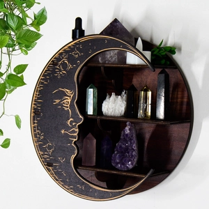 Moon-shaped wooden shelf with sun carvings, displaying crystals and candles