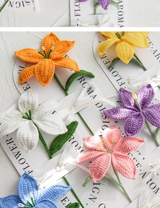 Detailed view of colorful handmade crochet lily flowers with decorative gift ribbons