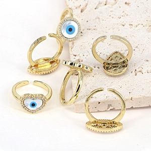Adjustable evil eye rings set in gold plating with heart shapes and sparkling zircon stones