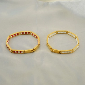 Elegant titanium steel beaded bracelet featuring gold, red, and white abacus design charms