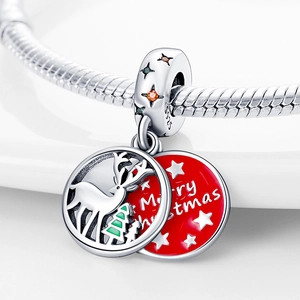Silver Christmas charms with reindeer and tree designs in red and green enamel