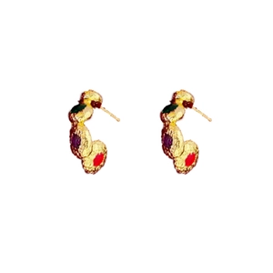 Vintage gold-tone C-shape earrings with colorful red, purple, and green gemstones