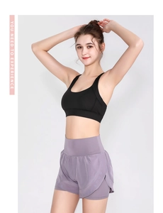 Close-up of lilac two-in-one sports shorts with high waist and breathable outer layer