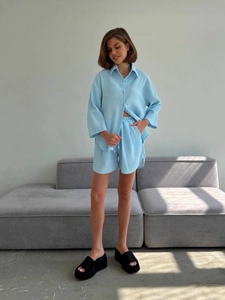 Women's light blue waffle texture lounge set with long sleeve shirt and drawstring shorts