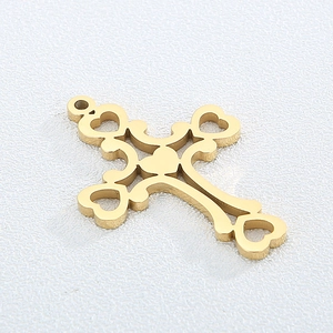 Golden hollow heart cross pendant made of polished metal with smooth finish