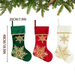 Velvet Christmas stockings set in red, green, and white with gold sequin snowflake patterns