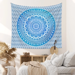Detailed blue and white bohemian mandala tapestry showing intricate geometric textile patterns
