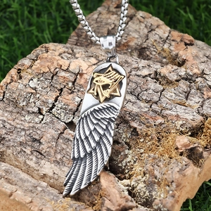 Vintage stainless steel wing pendant necklace with hexagram and eye of Horus details