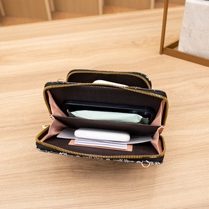 Black heart patterned crossbody phone bag with multi-card slots and pink lining interior