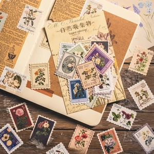 Vintage floral postage stamp stickers with botanical designs on retro paper background