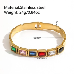 Titanium steel gold bangle with colorful square crystals shown in a 45-degree angle view
