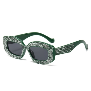 Green rhinestone cat-eye sunglasses with UV protection in a vintage Y2K style