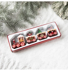 Detailed view of a four-carriage Christmas wooden train ornament in a festive gift box