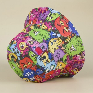 Close-up of colorful cartoon monster print on durable cotton fabric bucket hat