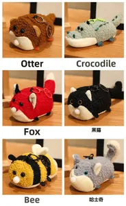 Detail of six plush animal charms including otter and husky in soft sherpa fleece