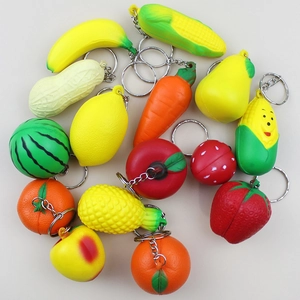 Detailed collection of assorted PU foam mini fruit and vegetable squishy keychains
