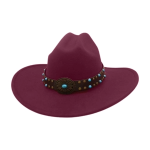 Detail of burgundy wool fedora featuring brown leather belt with turquoise and brass studs