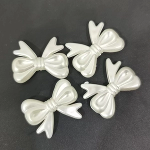 Set of four pearl white butterfly charms for DIY jewelry and hair accessories