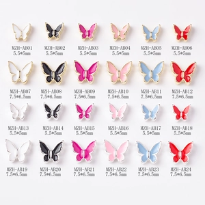 Enamel butterfly nail charms in various colors and gold or silver finishes
