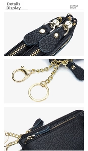 Close-up of black litchi grain leather pouch featuring gold zippers and lobster clasp