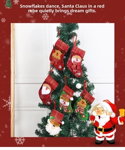Set of 6 Christmas stocking ornaments featuring 3D Santa, Snowman and Reindeer designs