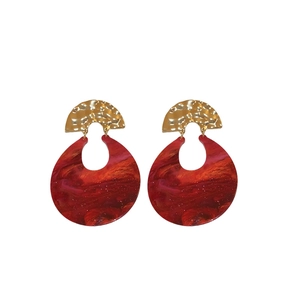 Retro red resin drop earrings with hammered gold metal finish on white background