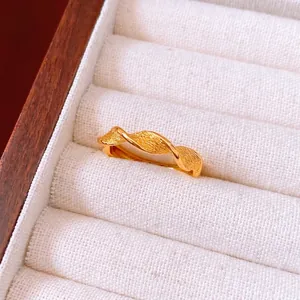 Vintage gold plated flower open ring with textured twist design in a gift box