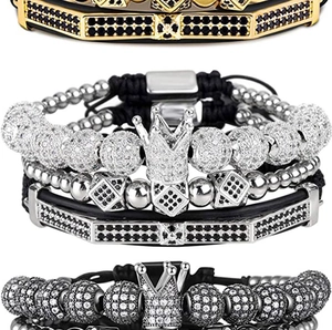 Detailed set of gold, silver and gun black crown bracelets with cubic zirconia inlays