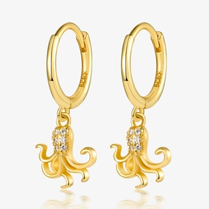 Close-up of gold octopus earrings with S925 hallmark and sparkling cubic zirconia stones