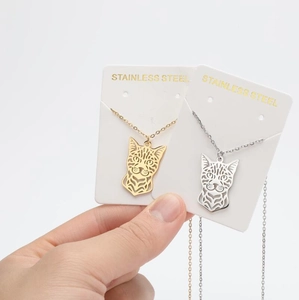 Minimalist stainless steel hollow cat pendant necklaces in gold and silver finishes