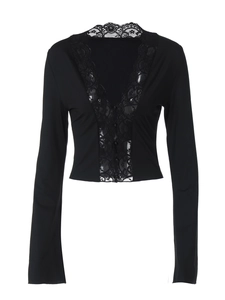 Detailed view of black slim fit top showing delicate lace trim and V-neck button details