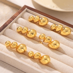 Bohemian gold plated water drop stud earrings in minimalist polished liquid metal style