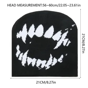 Detailed size guide for black knitted winter beanie with white fangs pattern design