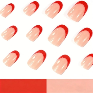 Classic red French tip press-on nails in almond shape on a clean white background